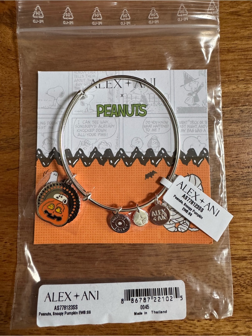 Alex and Ani Silver Tone Bangle with Orange Pumpkin Peanuts Charm